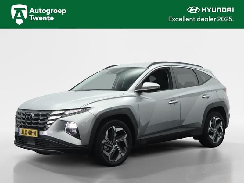 Shimmering silver (grijs metallic) Occasion 2023 Hyundai Tucson Comfort SUV | € 34.950 (Eerlijke prijs) - Afbeelding 1/4