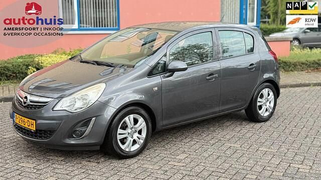 Grijs Gebruikt 2012 Opel Corsa Edition Hatchback | € 3.449 (Goede deal) - Afbeelding 1/4