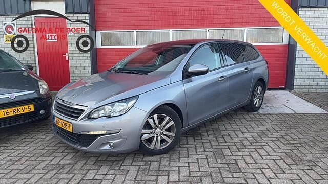 Grijs Occasion 2015 Peugeot 308 SW Stationwagen | € 7.444 (Goede deal) - Afbeelding 1/4