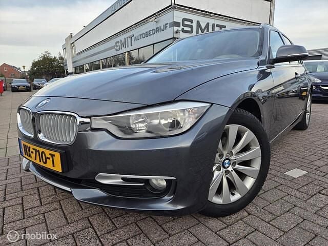 Grijs Occasion 2013 BMW 316 Executive Stationwagen | € 9.900 (Eerlijke prijs) - Afbeelding 1/4