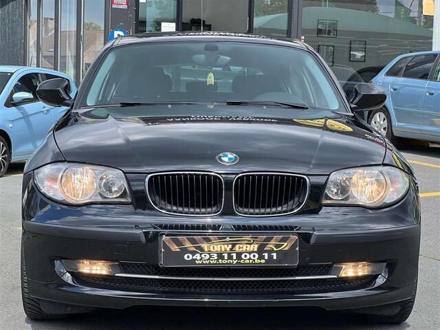 Zwart Gebruikt 2009 BMW 116 Hatchback | € 9.999 - Afbeelding 1/4