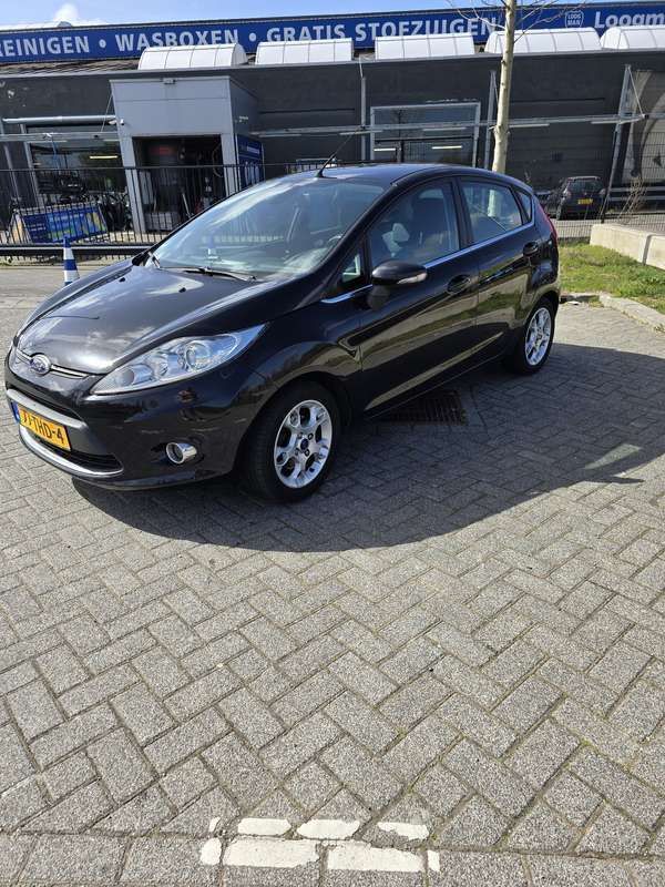 Zwart Gebruikt 2012 Ford Fiesta Titanium Hatchback | € 4.449 (Goede deal) - Afbeelding 1/4