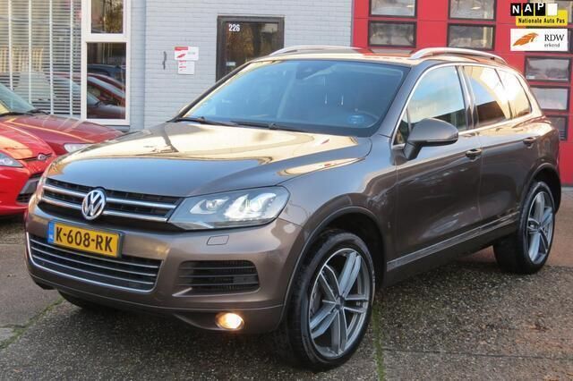Bruin, metallic lak Gebruikt 2011 VW Touareg SUV | € 12.450 - Afbeelding 1/4