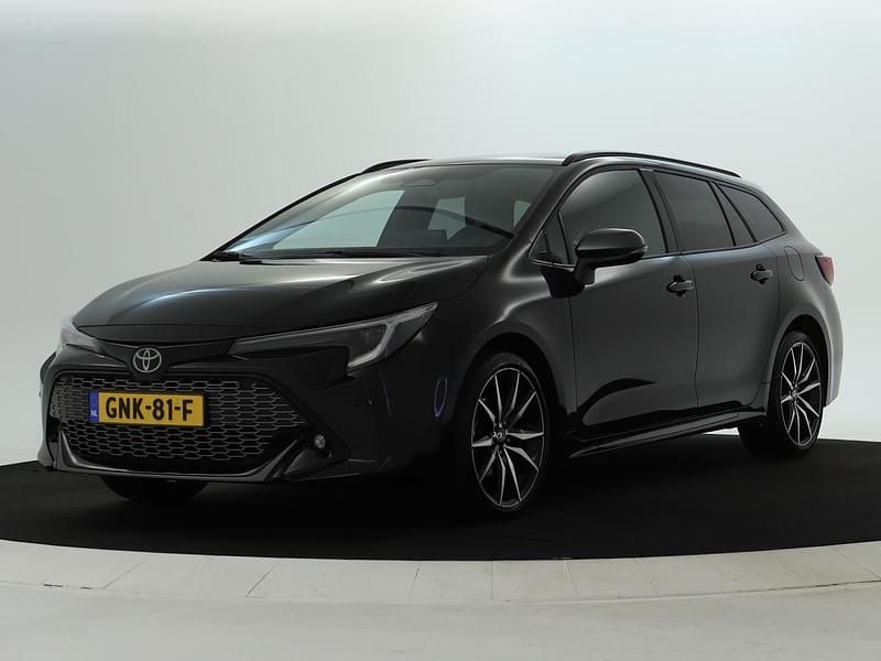 Zwart Gebruikt 2024 Toyota Corolla Hybrid Sport Stationwagen | € 34.950 (Eerlijke prijs) - Afbeelding 1/4