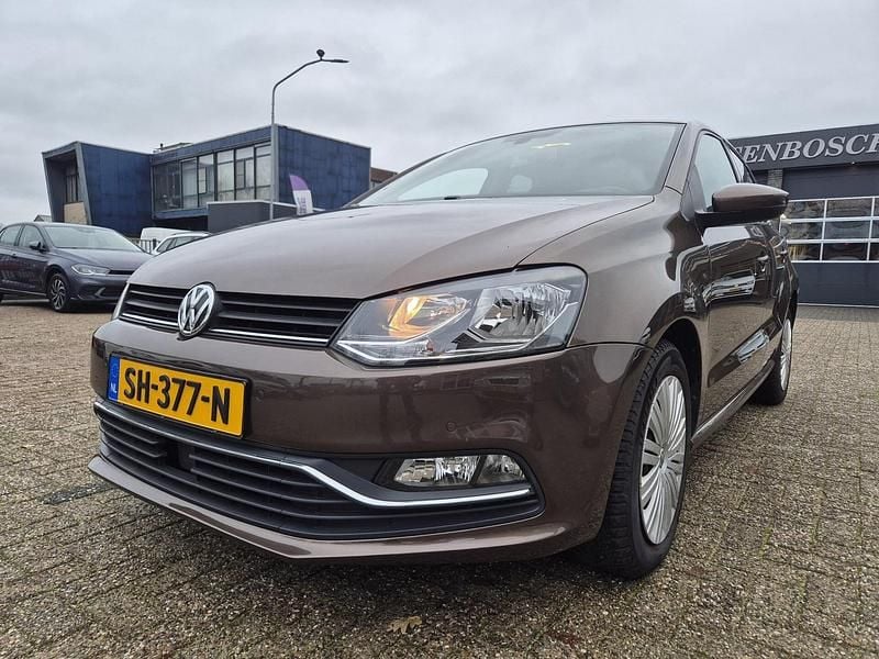 Bruin Gebruikt 2016 VW Polo Comfortline Hatchback | € 11.950 (Eerlijke prijs) - Afbeelding 1/4