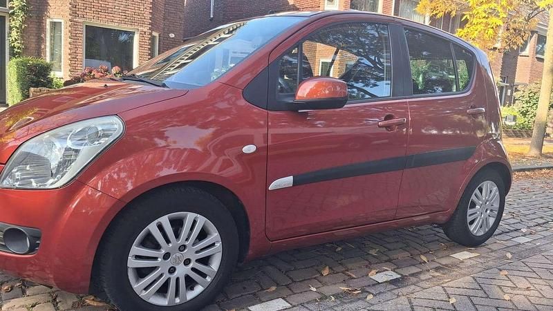 Oranje Gebruikt 2011 Suzuki Splash Exclusive Hatchback | € 3.950 (Goede deal) - Afbeelding 1/4
