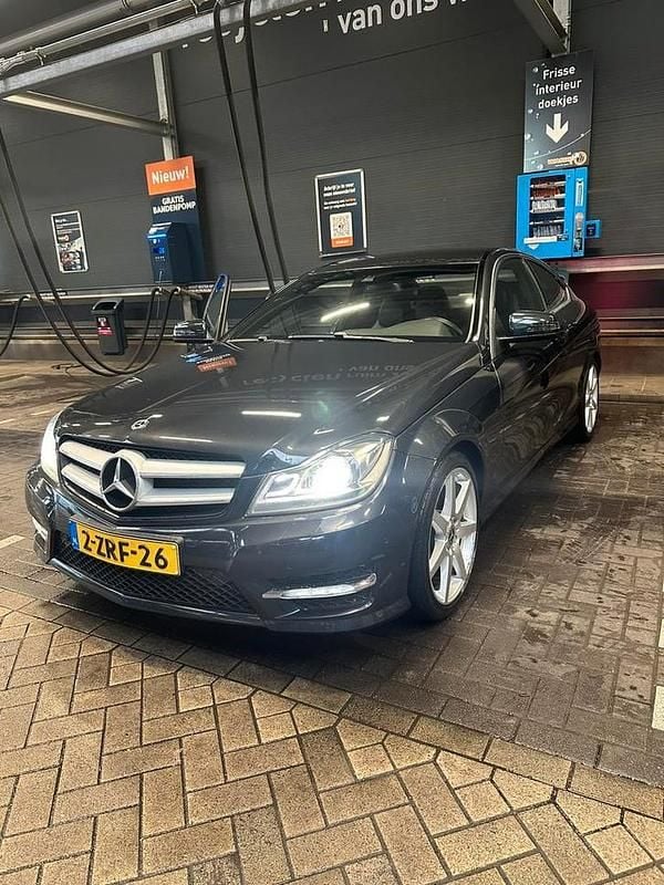 Occasion Mercedes C180 Ambition 156 PK (114 kW) 2015 Zwart Coupé