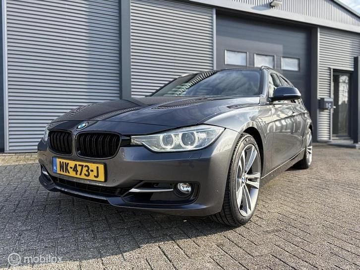 Grijs Occasion 2013 BMW 328 Executive Stationwagen | € 9.850 (Goede deal) - Afbeelding 1/4