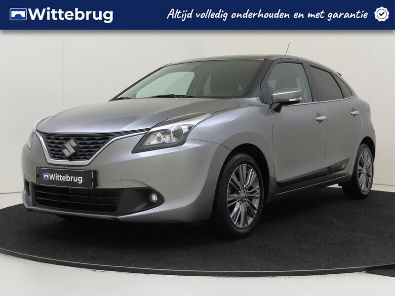 Grijs, metallic lak Gebruikt 2016 Suzuki Baleno Hatchback | € 14.425 (Iets duurder) - Afbeelding 1/3