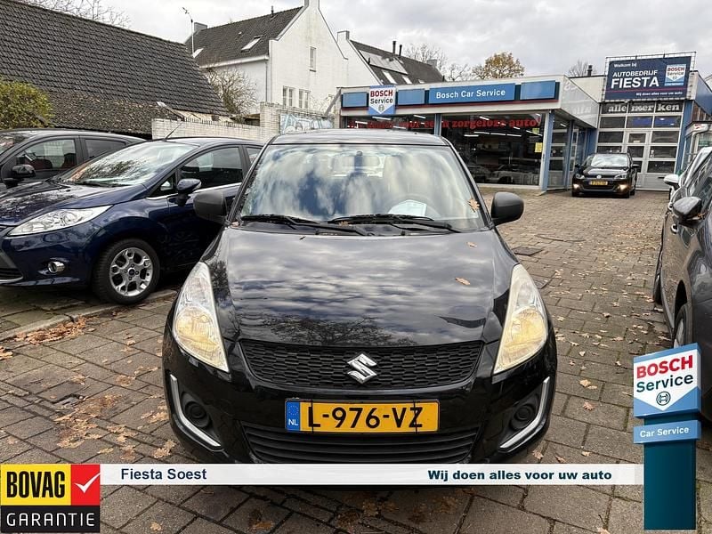 Zwart Gebruikt 2014 Suzuki Swift Hatchback | € 6.950 (Eerlijke prijs) - Afbeelding 1/4