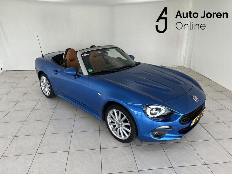 Blauw, metallic lak Gebruikt 2016 Fiat 124 Spider Lusso Cabriolet | € 21.941 (Iets duurder) - Afbeelding 1/4