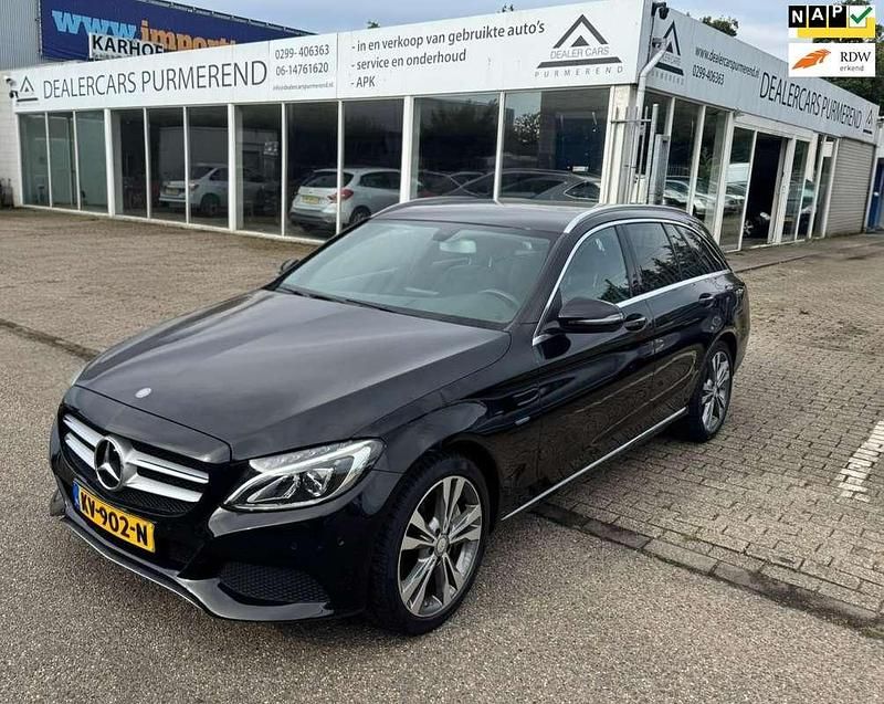Zwart, metallic lak Gebruikt 2016 Mercedes C350e Edition Stationwagen | € 17.950 - Afbeelding 1/4