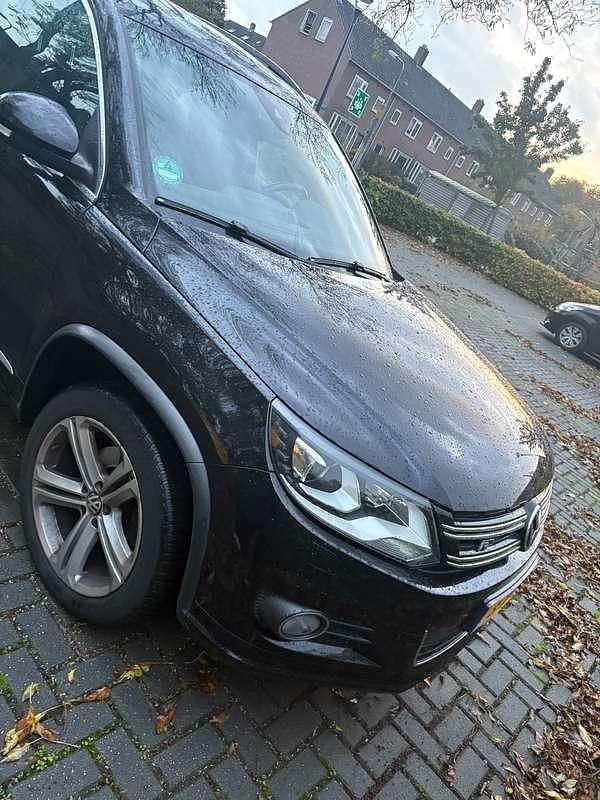 Zwart Gebruikt 2014 VW Tiguan R-line Edition SUV | € 13.500 (Iets duurder) - Afbeelding 1/4