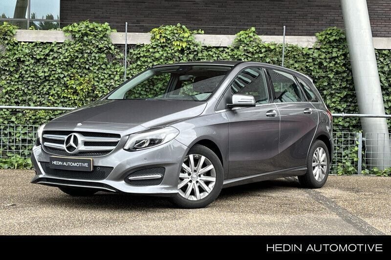 Grijs Gebruikt 2016 Mercedes B180 Ambition MPV | € 17.490 (Eerlijke prijs) - Afbeelding 1/4