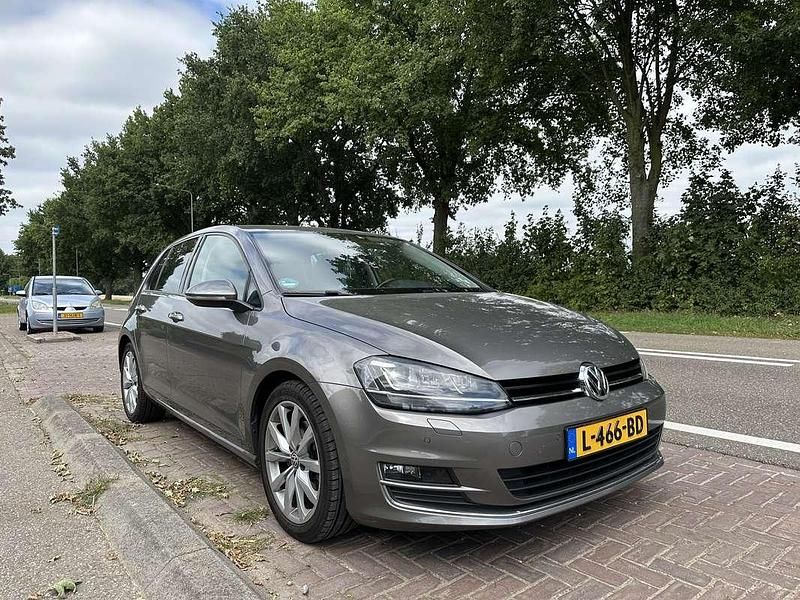 Brons Gebruikt 2016 VW Golf VII Highline Stationwagen | € 9.995 (Eerlijke prijs) - Afbeelding 1/4