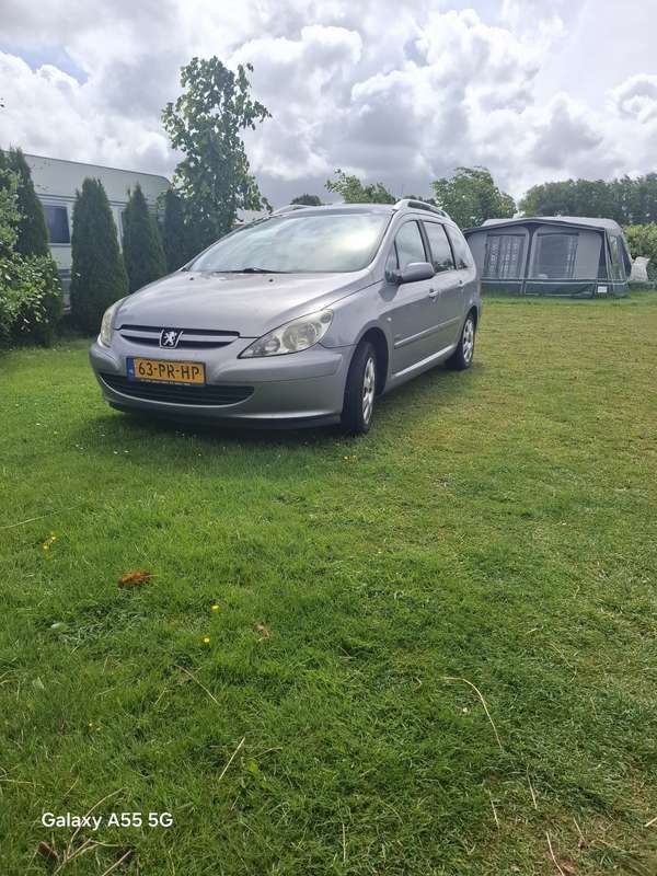 Grijs Gebruikt 2004 Peugeot 307 Stationwagen | € 1.200 (Eerlijke prijs) - Afbeelding 1/4