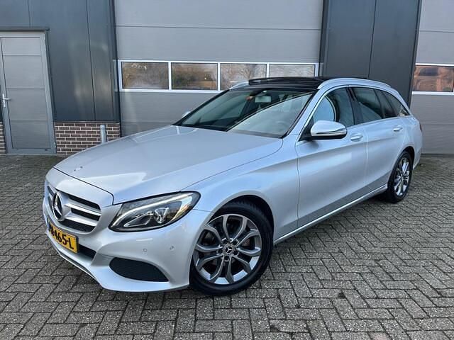 Grijs Occasion 2017 Mercedes C180 Premium Stationwagen | € 16.950 (Goede deal) - Afbeelding 1/4