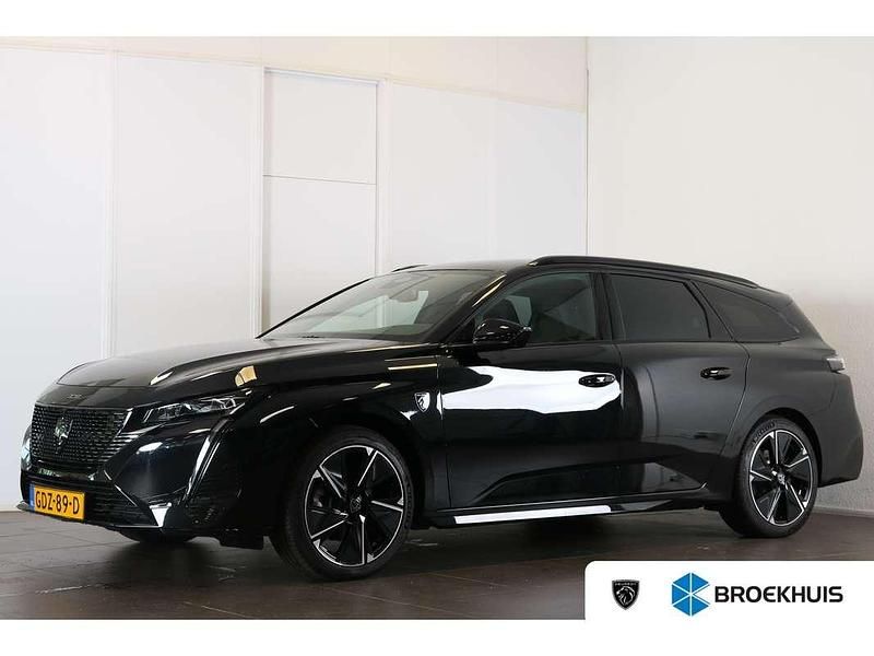 Zwart Gebruikt 2024 Peugeot e-308 SW GT Stationwagen | € 32.400 (Eerlijke prijs) - Afbeelding 1/4