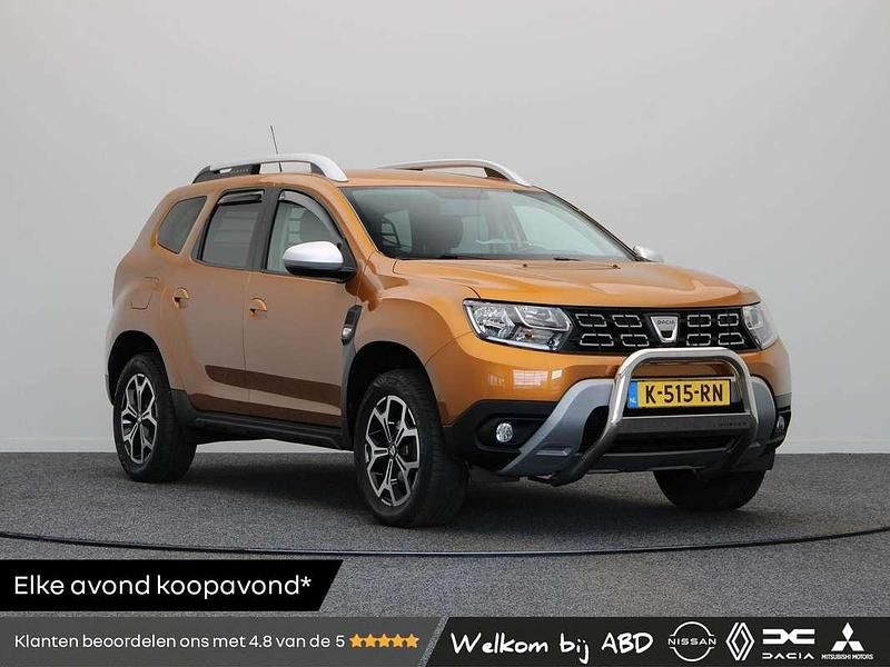 Oranje Gebruikt 2021 Dacia Duster Prestige SUV | € 12.945 (Eerlijke prijs) - Afbeelding 1/3