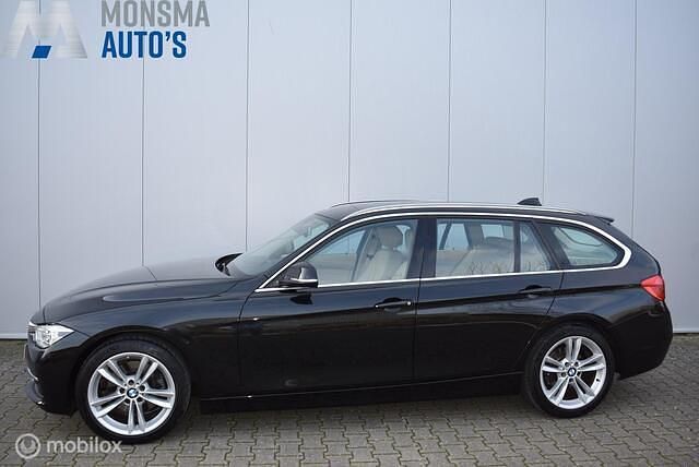 Occasion BMW 330 Executive 252 PK (185 kW) 2017 Zwart Stationwagen