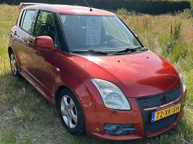 Oranje Gebruikt 2007 Suzuki Swift GLS Hatchback | € 2.499 (Super prijs) - Afbeelding 1/4