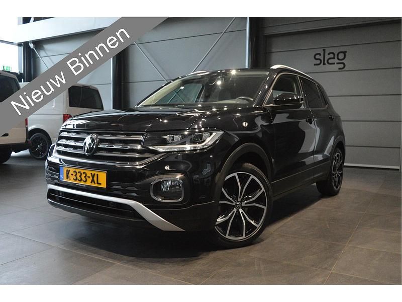 Zwart Gebruikt 2021 VW T-Cross Style SUV | € 23.900 (Eerlijke prijs) - Afbeelding 1/4
