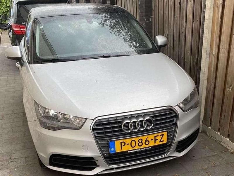 Grijs Gebruikt 2012 Audi A1 Ambition Hatchback | € 7.995 (Goede deal) - Afbeelding 1/4