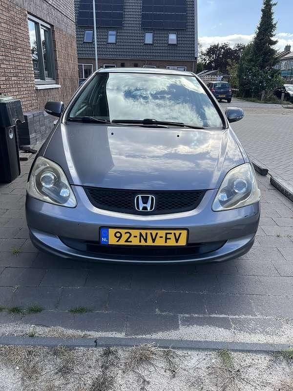 Grijs Gebruikt 2004 Honda Civic LS Hatchback | € 1.699 (Eerlijke prijs) - Afbeelding 1/4