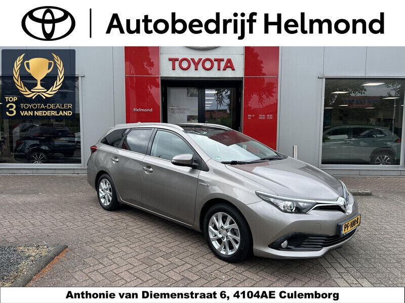 Bruin Gebruikt 2016 Toyota Auris Hybrid Stationwagen | € 16.799 (Iets duurder) - Afbeelding 1/4