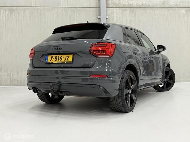 Grijs (metallic) Gebruikt 2017 Audi Q2 S-Line SUV | € 22.940 (Eerlijke prijs) - Afbeelding 1/4