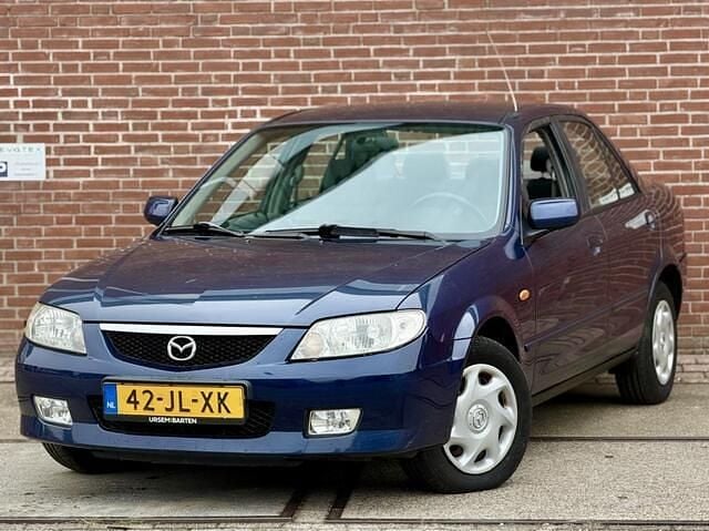 Blauw Gebruikt 2002 Mazda 323 Touring Sedan | € 2.450 (Duur) - Afbeelding 1/4