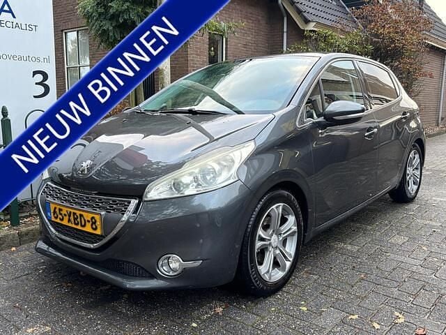 Grijs Gebruikt 2012 Peugeot 208 Allure Hatchback | € 4.998 (Eerlijke prijs) - Afbeelding 1/4