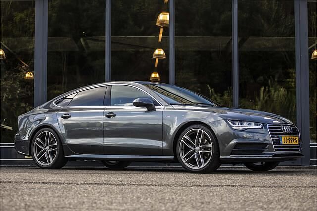 Grijs, metallic lak Gebruikt 2016 Audi A7 Sportback Proline Hatchback | € 21.950 (Eerlijke prijs) - Afbeelding 1/4