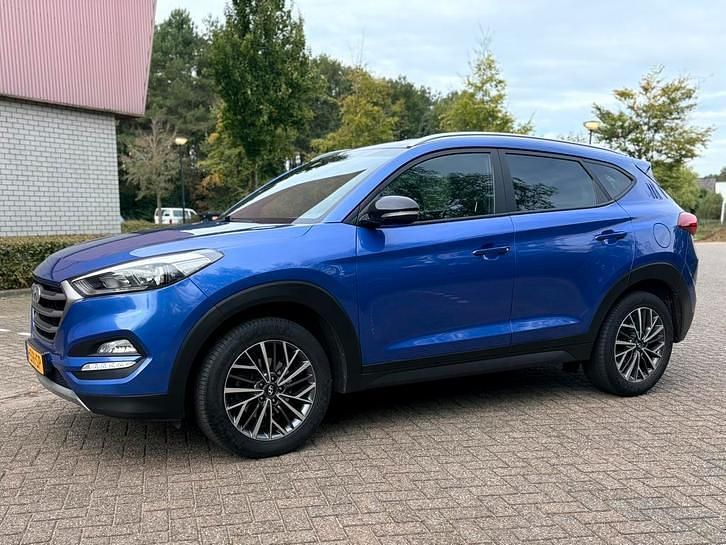 Blauw (metallic) Gebruikt 2018 Hyundai Tucson Premium SUV | € 17.250 (Eerlijke prijs) - Afbeelding 1/4