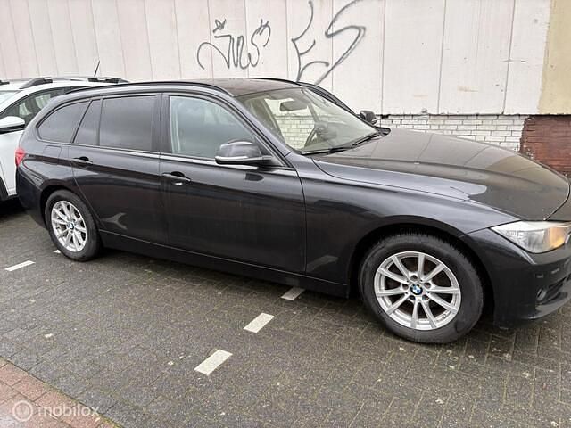 Occasion BMW 316 Executive 116 PK (85 kW) 2014 Zwart Stationwagen