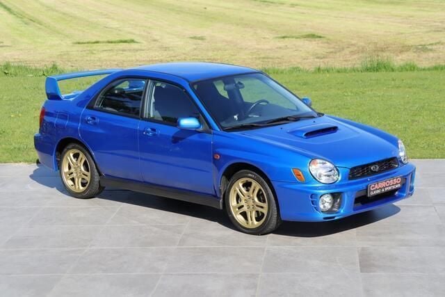 Blauw, metallic lak Gebruikt 2002 Subaru Impreza Sedan | € 36.750 - Afbeelding 1/4