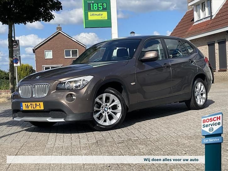 Bruin Occasion 2010 BMW X1 Executive SUV | € 12.750 (Iets duurder) - Afbeelding 1/4