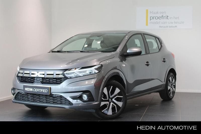 Grijs Gebruikt 2024 Dacia Sandero Expression Hatchback | € 20.400 (Eerlijke prijs) - Afbeelding 1/4