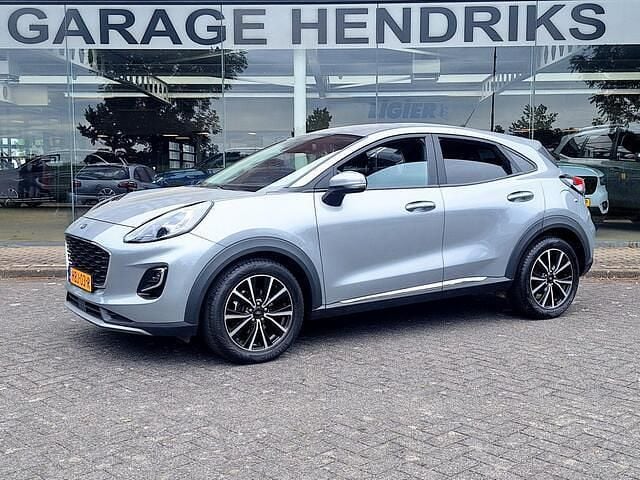 Grijs Gebruikt 2022 Ford Puma Gen-E Titanium SUV | € 19.645 (Goede deal) - Afbeelding 1/4