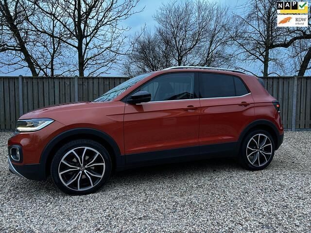 Oranje, metallic lak Gebruikt 2024 VW T-Cross Business SUV | € 29.950 (Eerlijke prijs) - Afbeelding 1/4