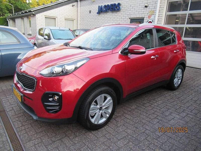 Rood, metallic lak Gebruikt 2018 Kia Sportage SUV | € 17.900 (Eerlijke prijs) - Afbeelding 1/4