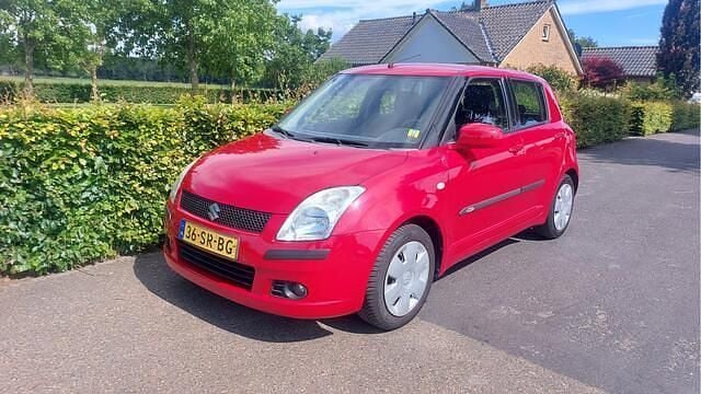 Rood Gebruikt 2006 Suzuki Swift GLS Hatchback | € 895 (Super prijs) - Afbeelding 1/4