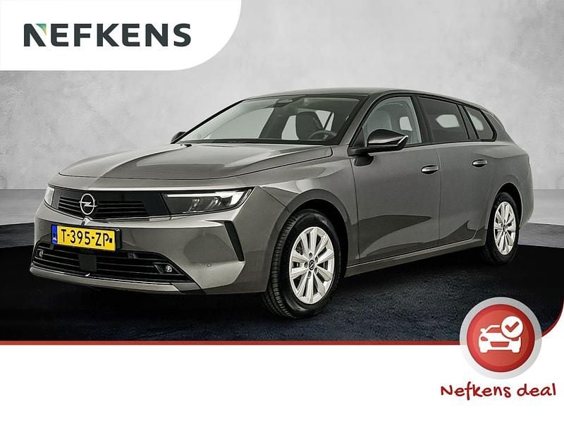 Grijs Gebruikt 2023 Opel Astra Business Edition Stationwagen | € 22.995 (Eerlijke prijs) - Afbeelding 1/4