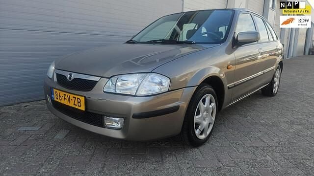 Grijs Gebruikt 2000 Mazda 323 | € 1.750 - Afbeelding 1/4