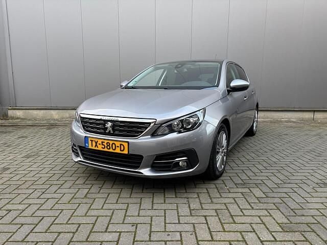 Grijs Gebruikt 2018 Peugeot 308 Premium Hatchback | € 11.950 (Goede deal) - Afbeelding 1/4