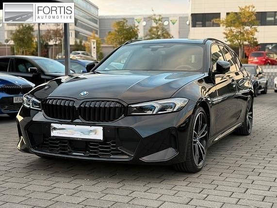 Zwart Gebruikt 2024 BMW 320 M Sport Stationwagen | € 60.895 - Afbeelding 1/4