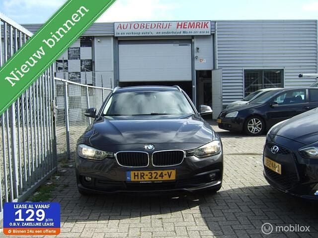 Bruin Occasion 2015 BMW 320 Stationwagen | € 6.950 (Goede deal) - Afbeelding 1/4