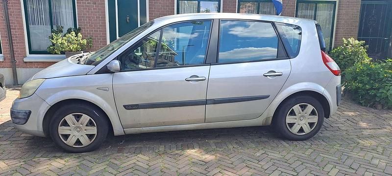 Grijs Gebruikt 2005 Renault Mégane II MPV | € 750 (Eerlijke prijs) - Afbeelding 1/4