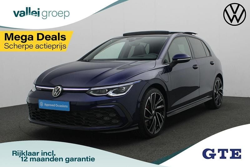 Blauw, metallic lak Gebruikt 2021 VW Golf VIII GTE Hatchback | € 29.900 (Duur) - Afbeelding 1/4