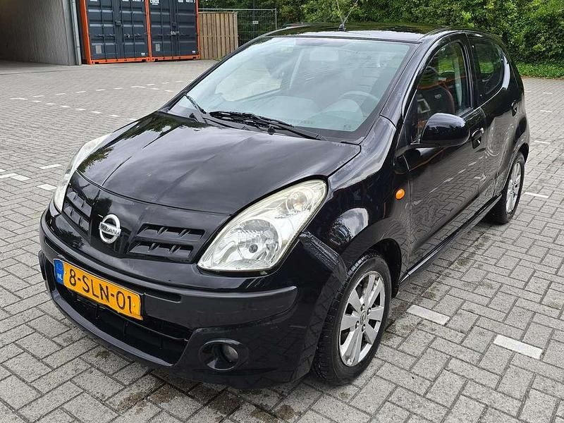 Zwart Gebruikt 2013 Nissan Pixo S Hatchback | € 1.500 (Super prijs) - Afbeelding 1/4